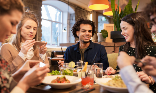 Digital menu showing upsell options and extras